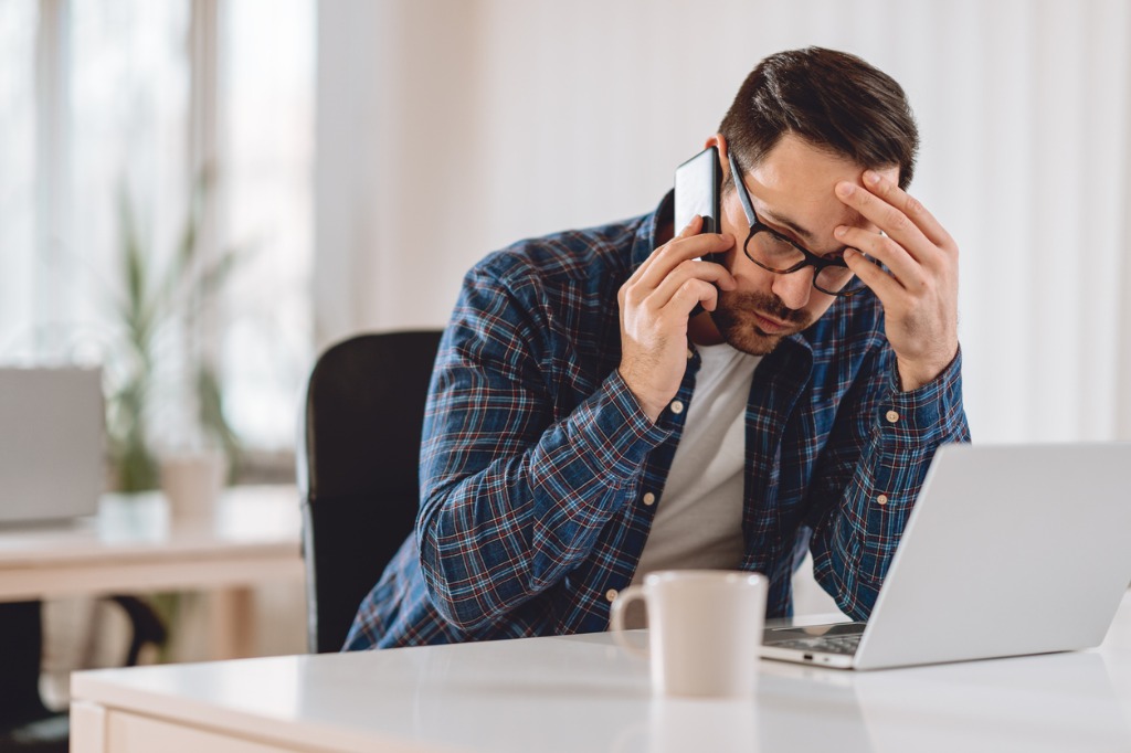 unhappy-businessman-on-computer