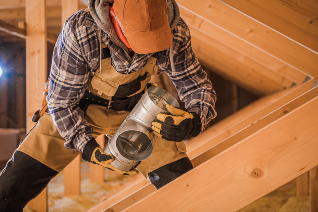 contractor-working-in-attic